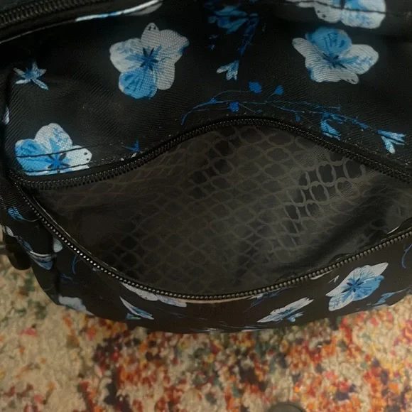 Floral rolling backpack